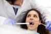 A woman having her teeth cleaned